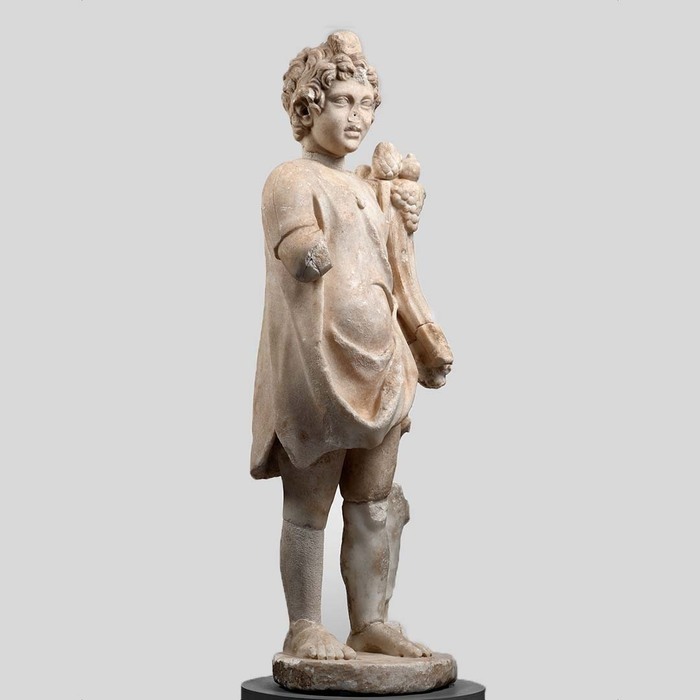 Statue, portant des restauratino au niveau de la jambe gauche, représentant Harpocrate